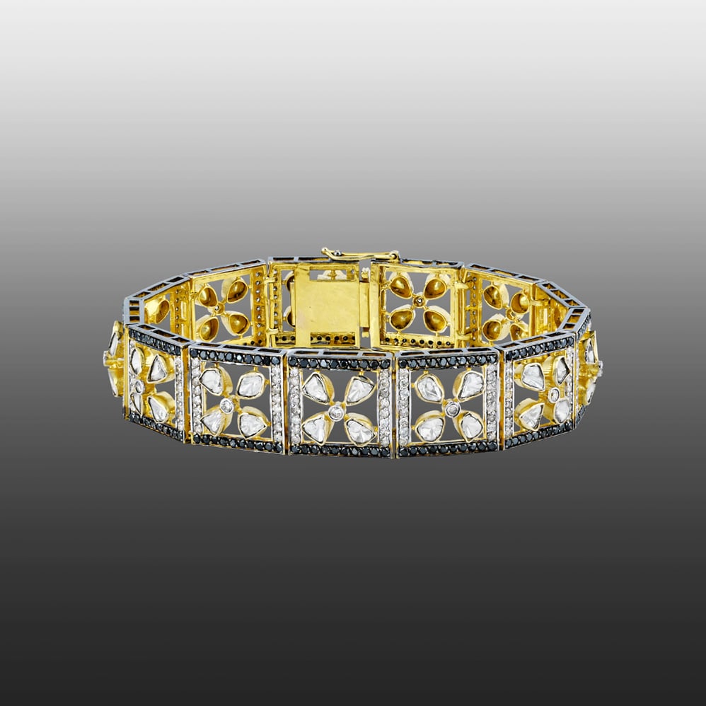Tennis Bracelet with Floral Polkis and Black Diamond Border